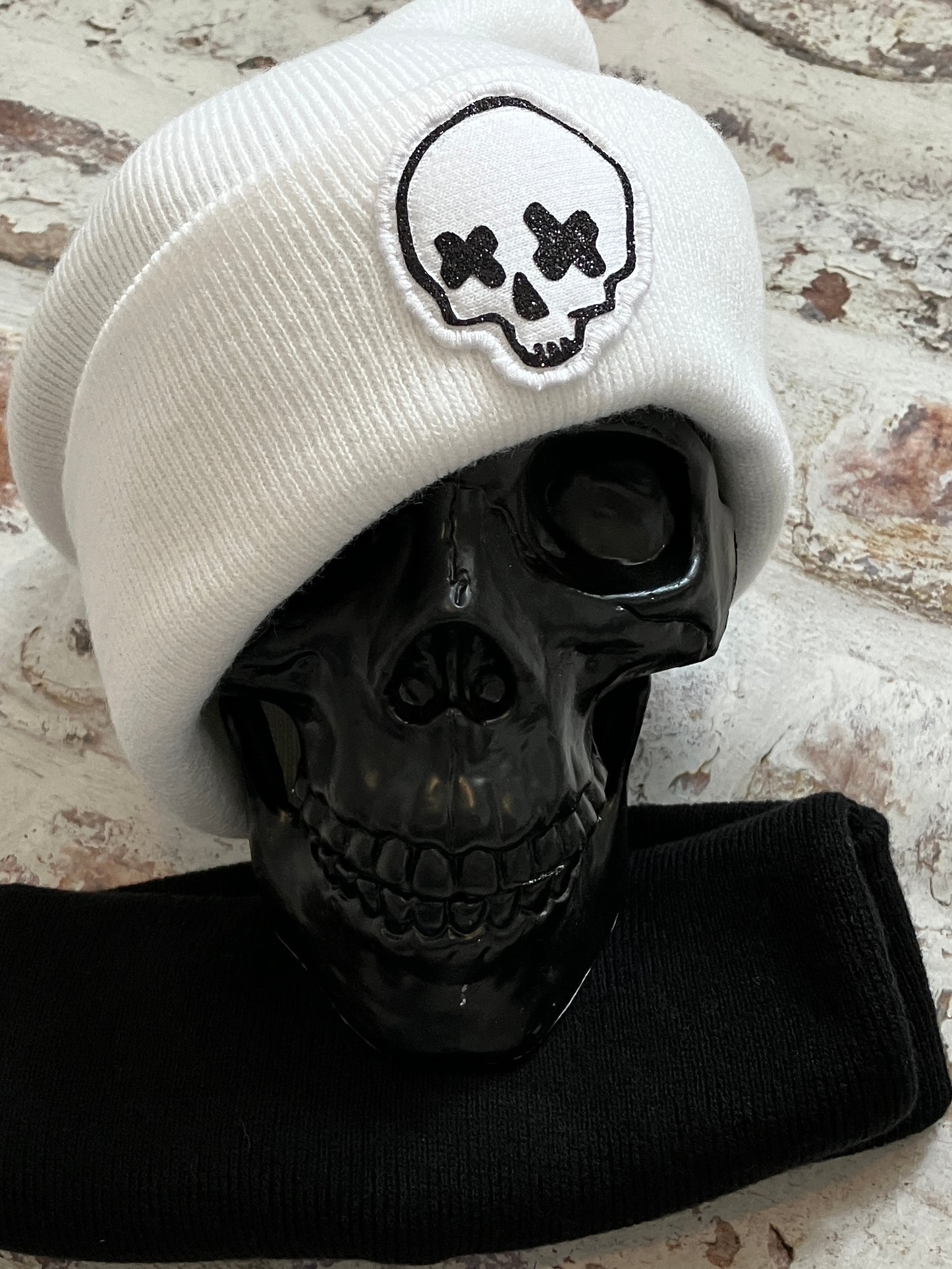 Miniature cross eyed skull beanie