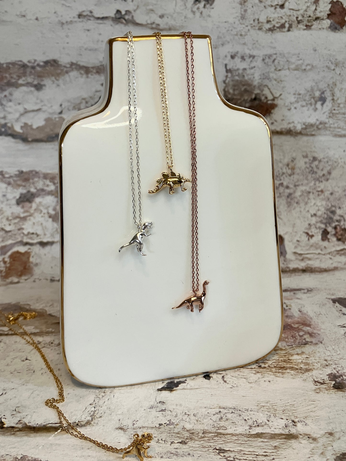 Rose Gold Diplodocus necklace - Micro dinosaur