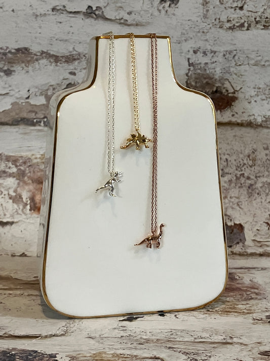Gold Stegosaurus necklace - micro dinosaur jewellery