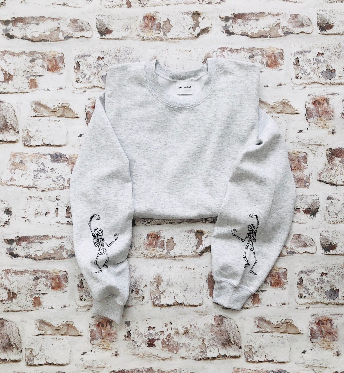 Dancing skeleton sleeved sweatshirt