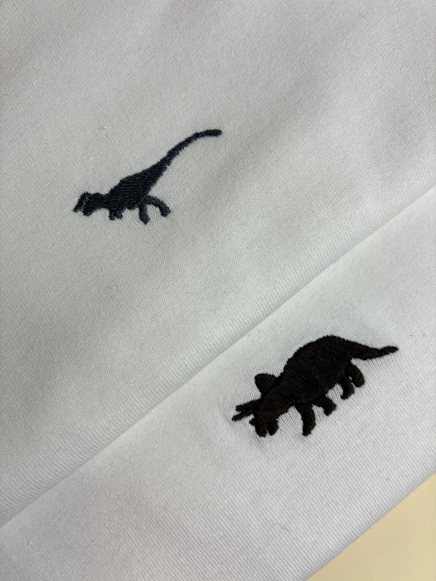 Embroidered miniature dinosaur T-shirt - customisable