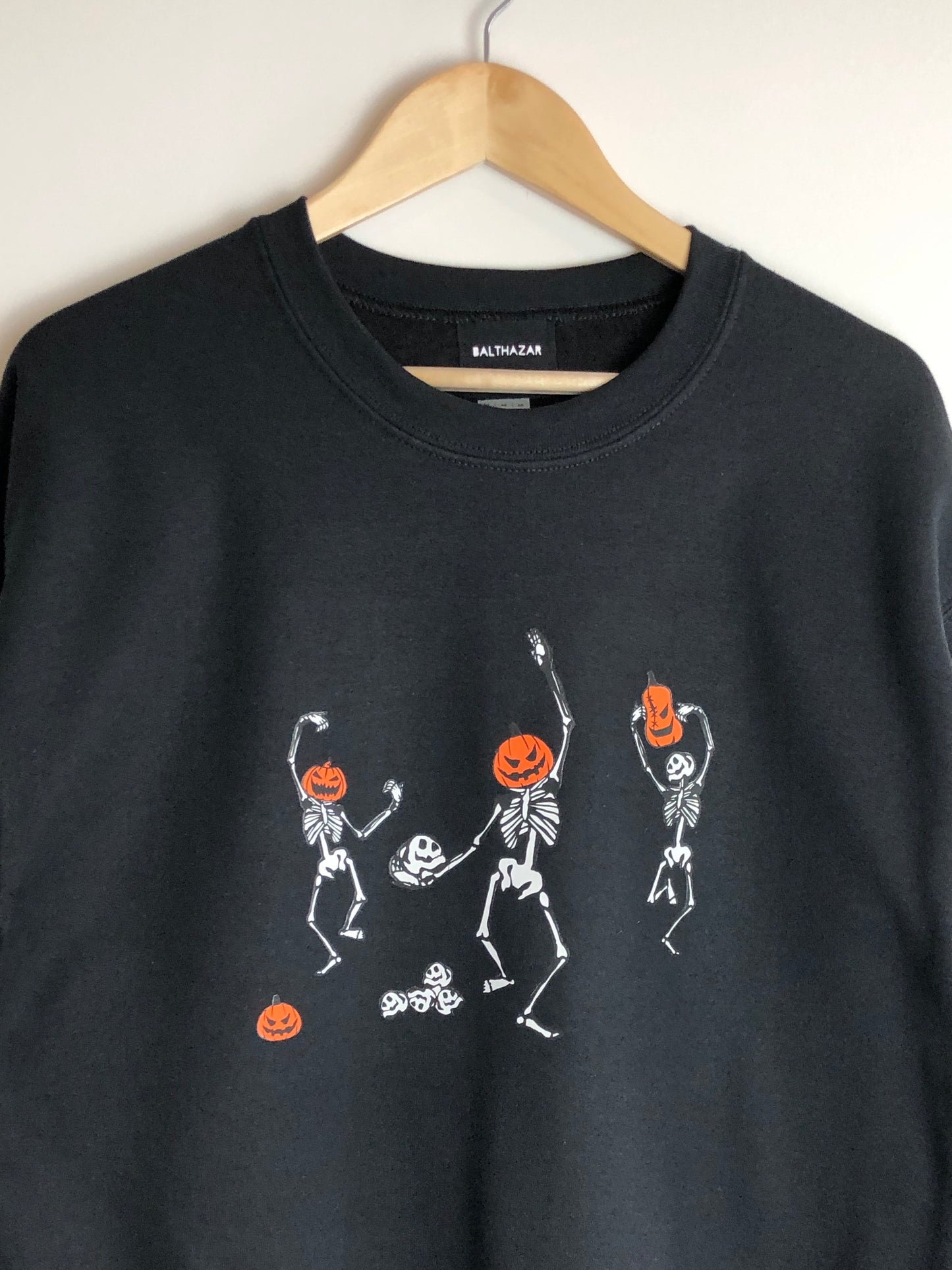 Dancing pumpkin headed skeleton sweatshirt