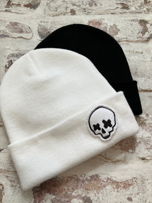 Miniature cross eyed skull beanie