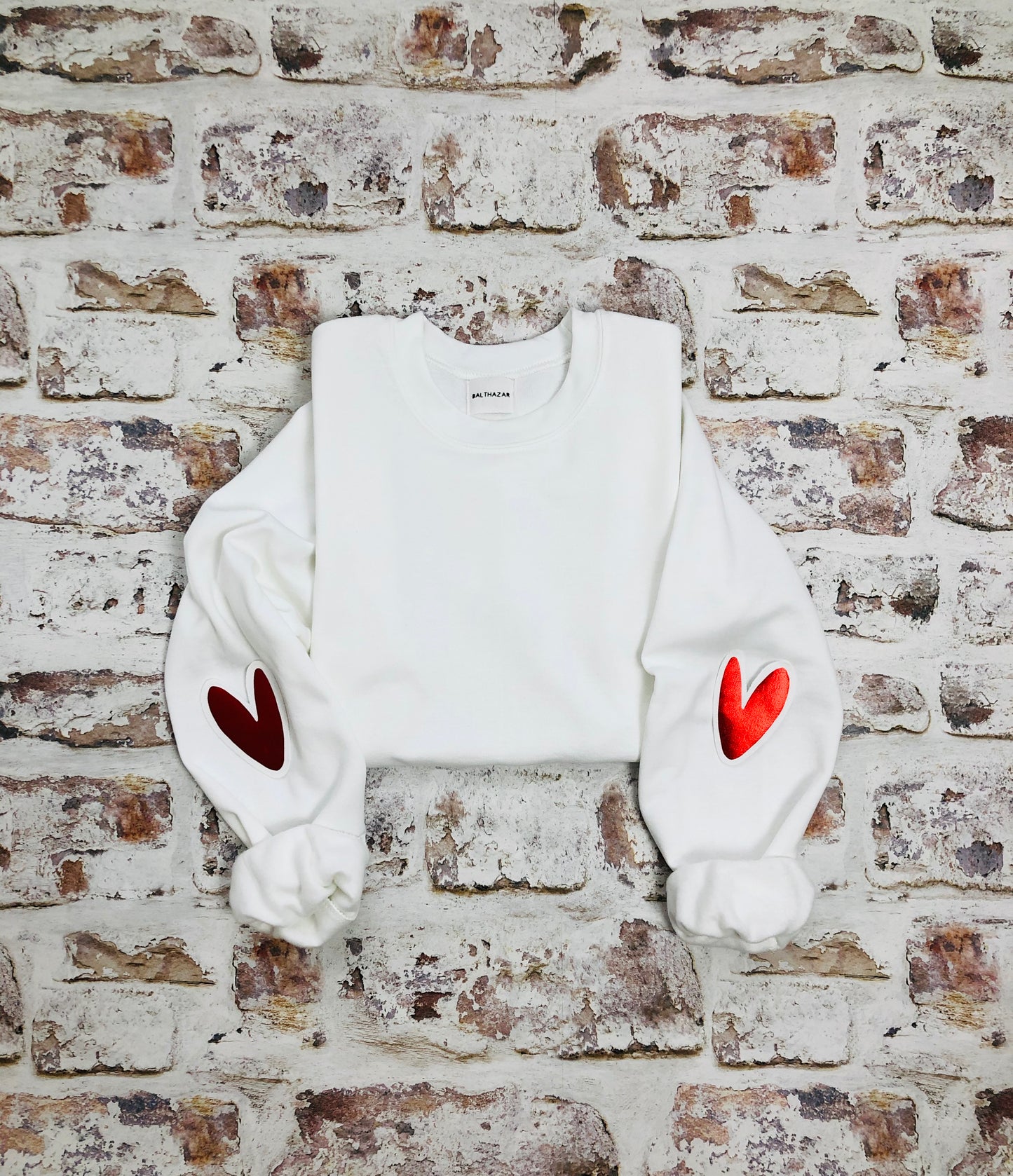 Love heart elbow placement sweatshirt
