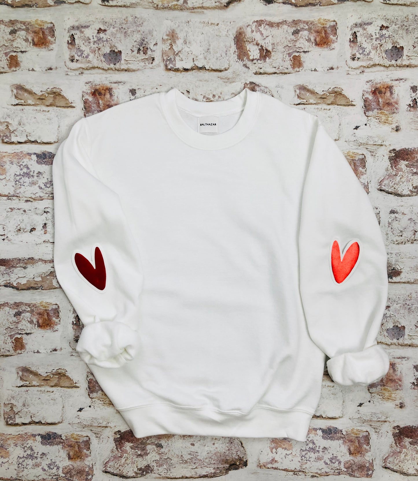 Love heart elbow placement sweatshirt