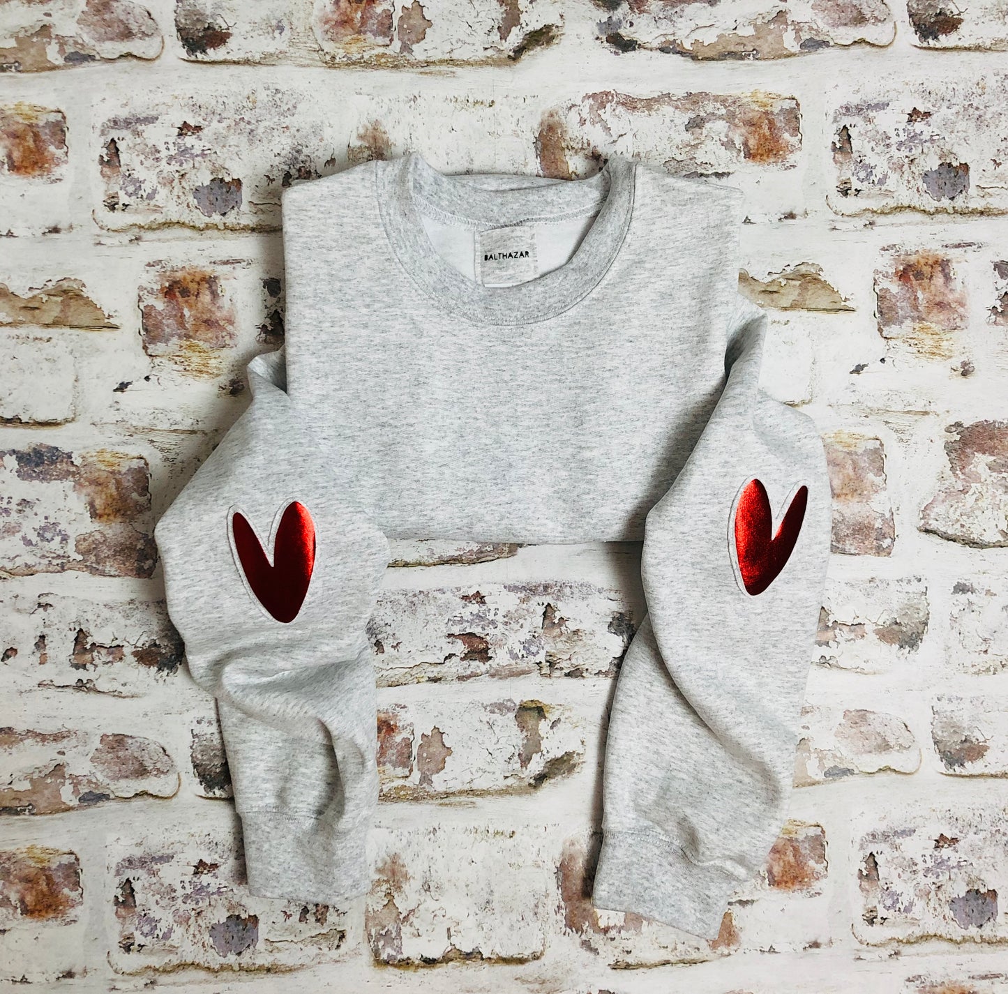 Love heart elbow placement sweatshirt