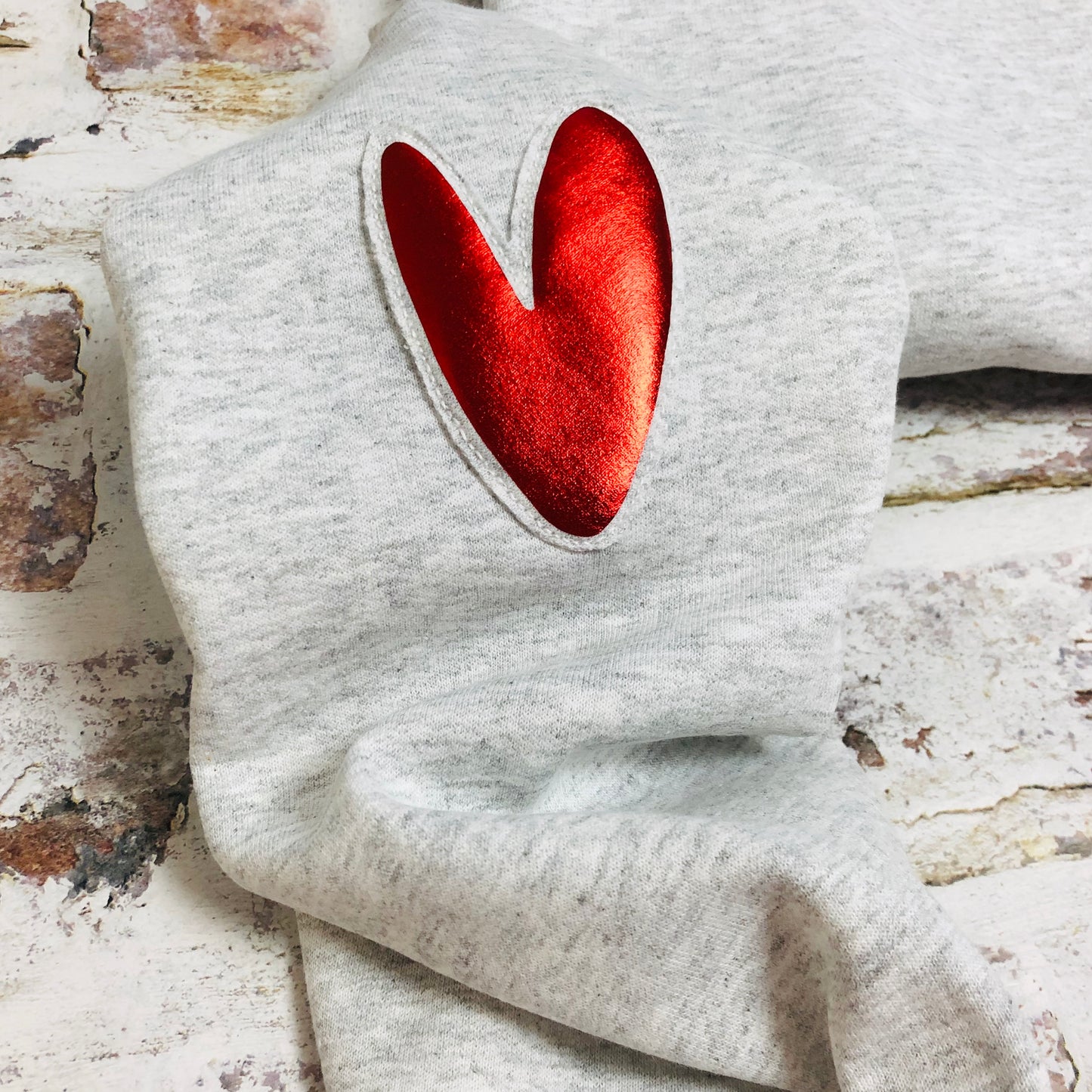 Love heart elbow placement sweatshirt