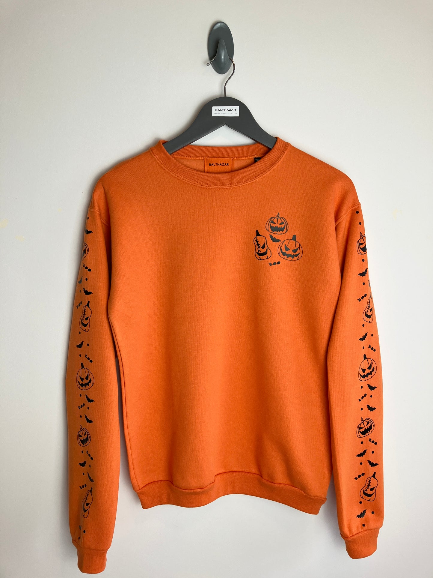 Pumpkin headed confetti sleeved sweatshirt