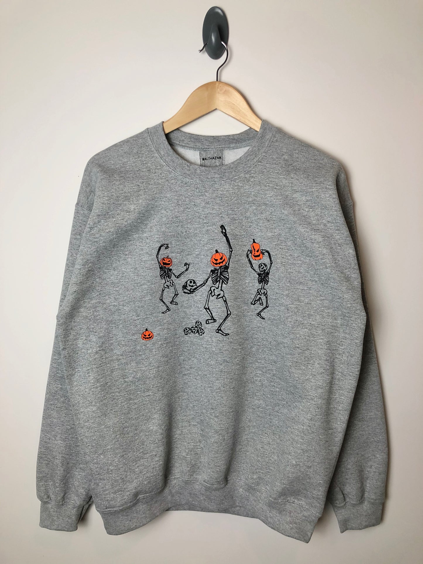 Dancing pumpkin headed skeleton sweatshirt