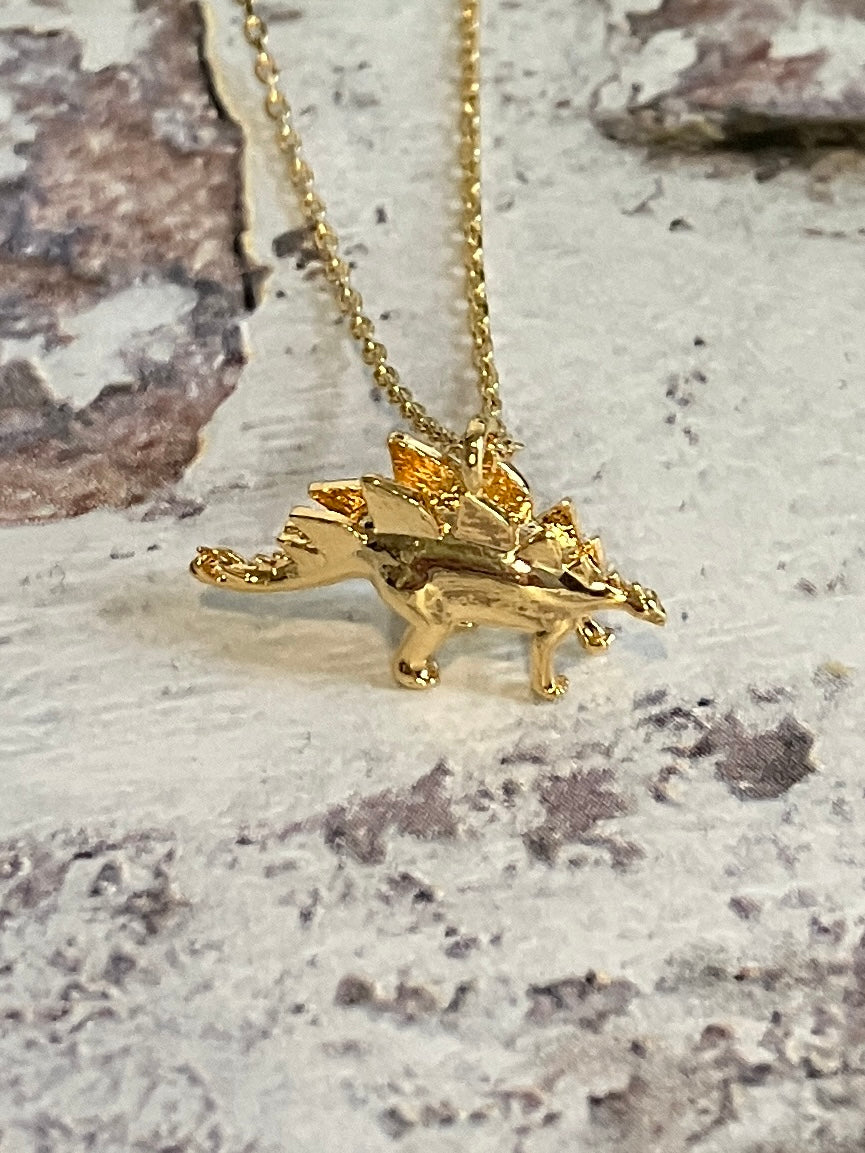 Gold Stegosaurus necklace - micro dinosaur jewellery