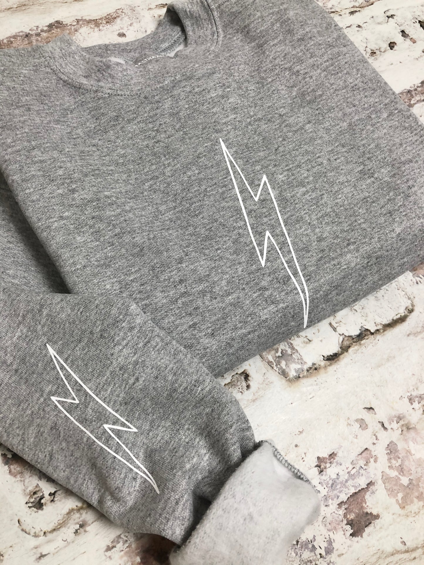 Outline lightning bolt sweatshirt - unisex geometric design