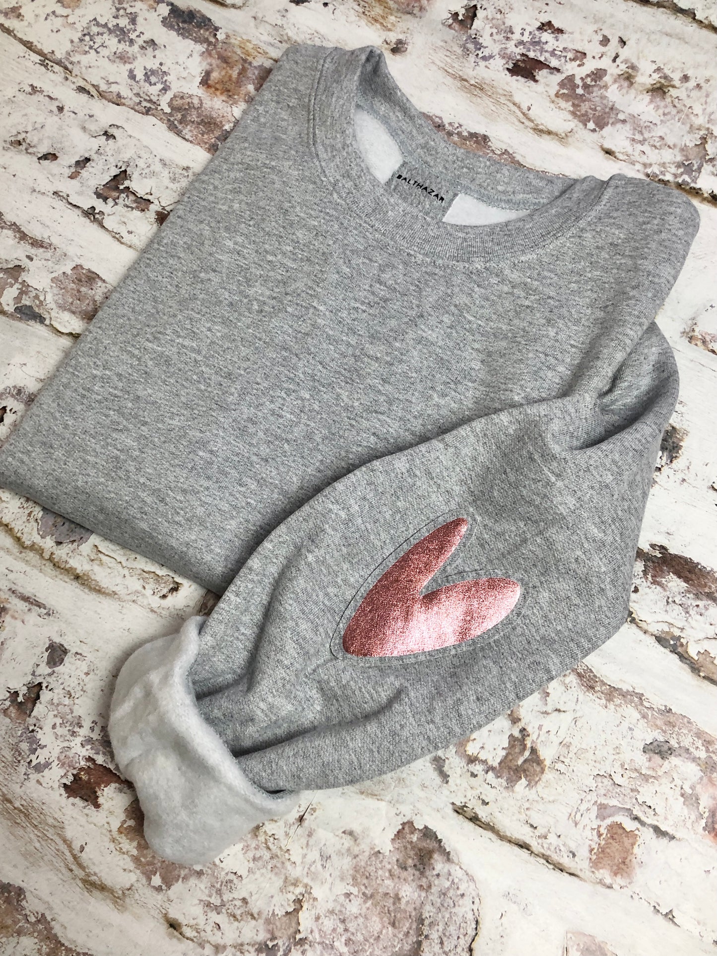 Love heart elbow placement sweatshirt