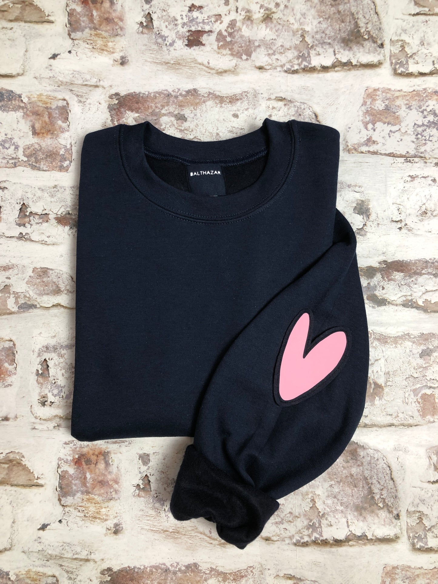 Love heart elbow placement sweatshirt